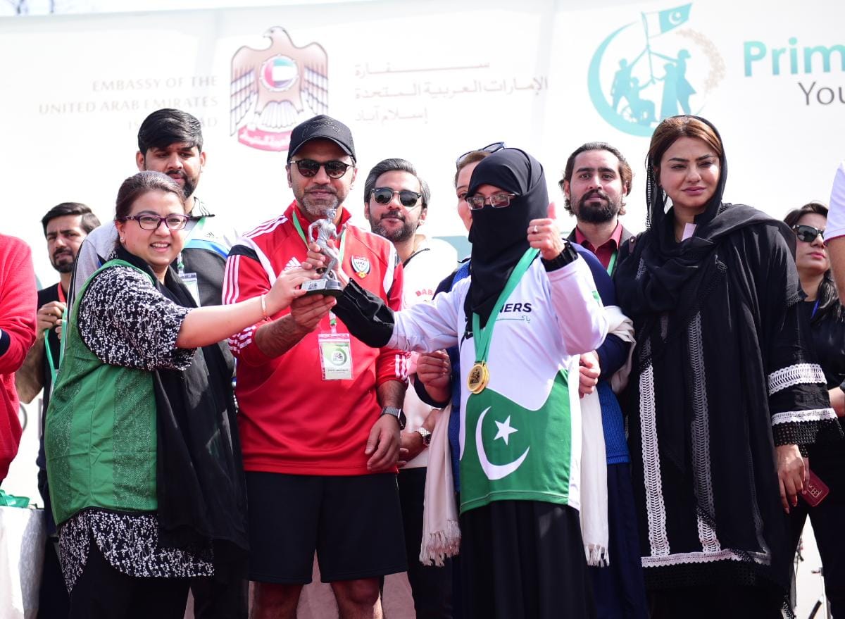 SAPM on Youth Affairs, Ms. Shaza Fatima Khawaja distributing trophies and medals to the winners from the marathon race held  at Constitution Avenue Islamabad.